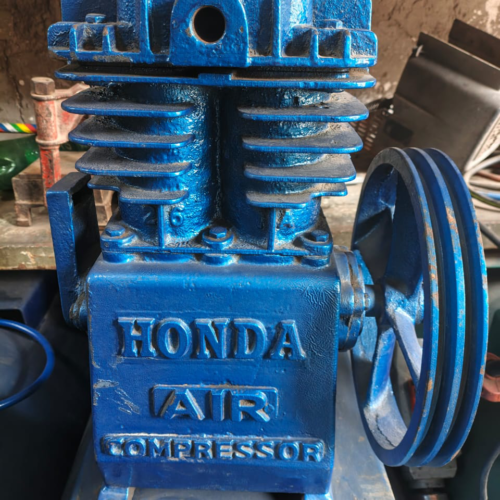 Double piston local air compressor